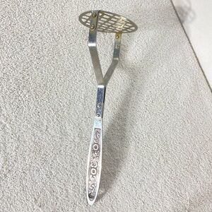 Vintage Japan Silver Tone Metal Potato Masher W Textured Flowers On Handle